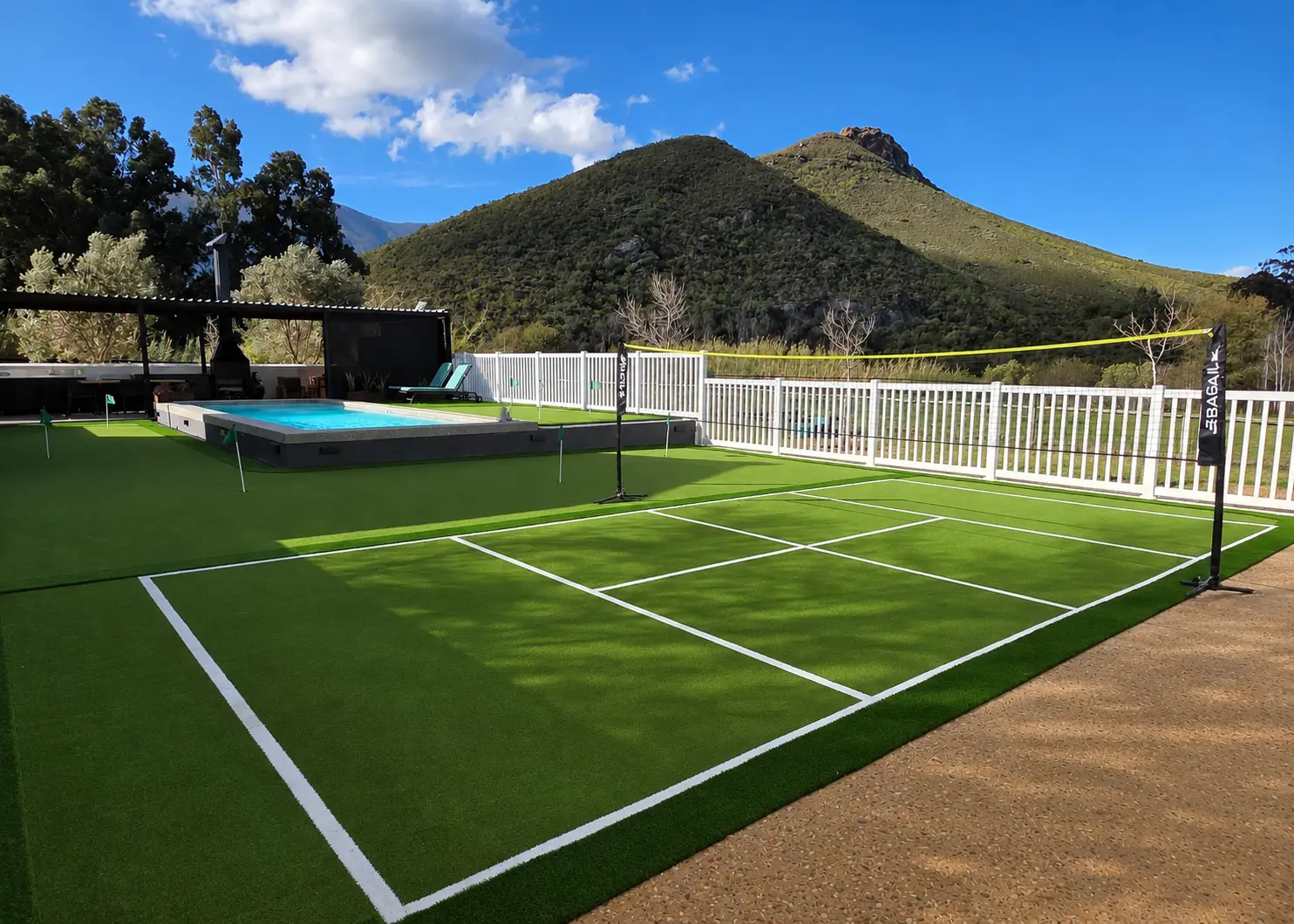 Private Strings outdoor area at Klawerjas with swimming pool, putting green, badminton court and covered braai area